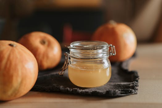 an array of healthy drinks, including water, tea, and apple cider vinegar