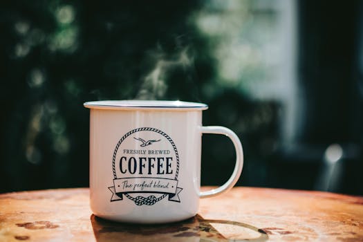 image of a steaming cup of coffee with MCT oil