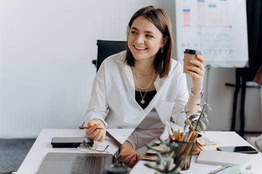 image of a person enjoying coffee with a notebook