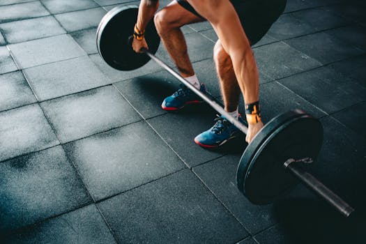 man lifting weights